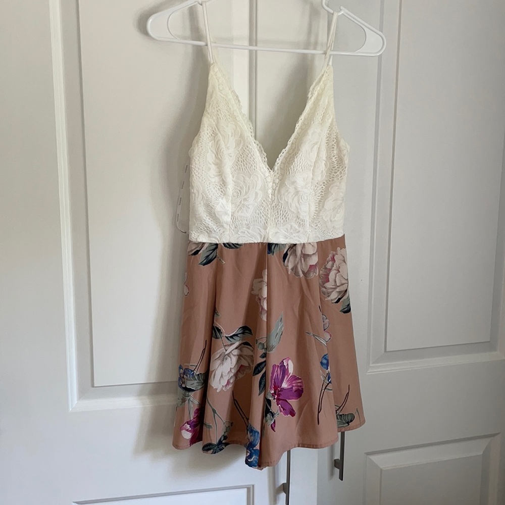 White and floral romper